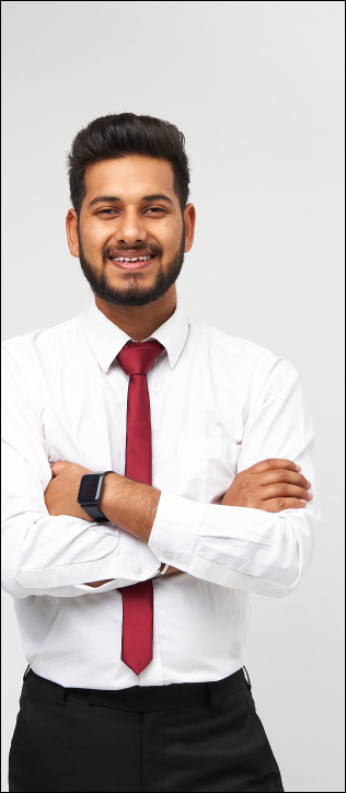 portrait-young-indian-top-manager-t-shirt-tie-crossed-arms-smiling-white-isolated-wall.png